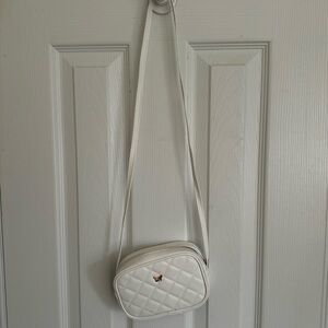 White Quilted Crossbody Bag with Rose Gold Bow Accent